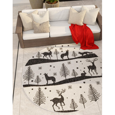 Le tapis Holiday Aisle® Kareema