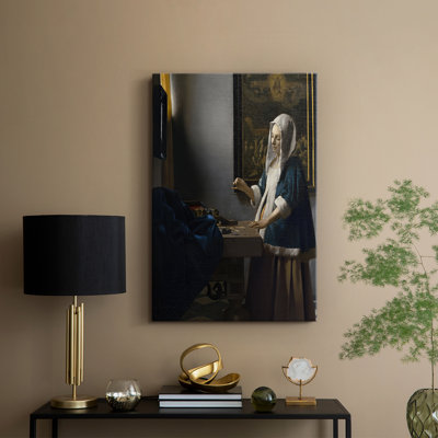 Femme tenant une balance - Toile tendue par Jean Vermeer