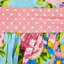 Tablier rétro à motif floral et pois