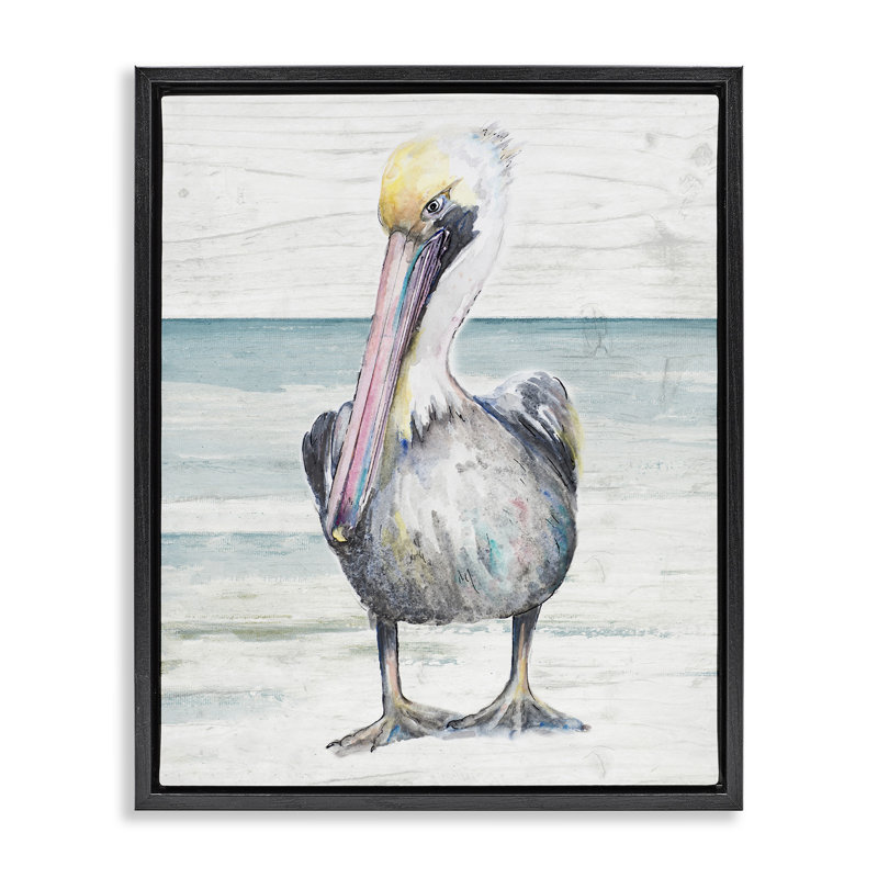 Pélican debout sur la plage, Cadre flottant noir de jais, 31" H x 25" W