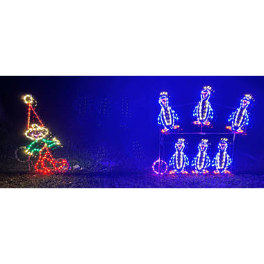 Animated Elf Bowling with Penguin Pins Christmas Lighted Display