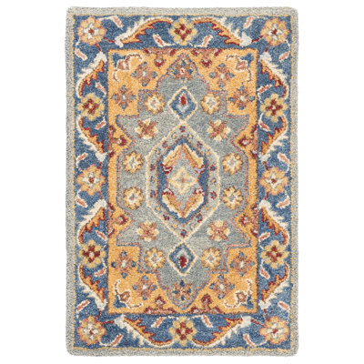 Antiquity Hand Tufted Wool/Cotton Oriental Rug in Blue/Gold