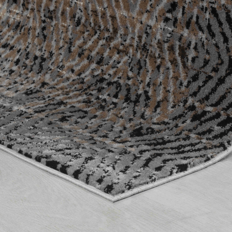 Tapis intérieur / extérieur brun / noir à motif géométrique de 7 pi x 10 pi (6 pi 7 po x 9 pi 6 po) de Branch Branch Ihsan