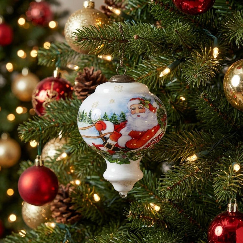 Ornement père Noël chevauchant un traîneau