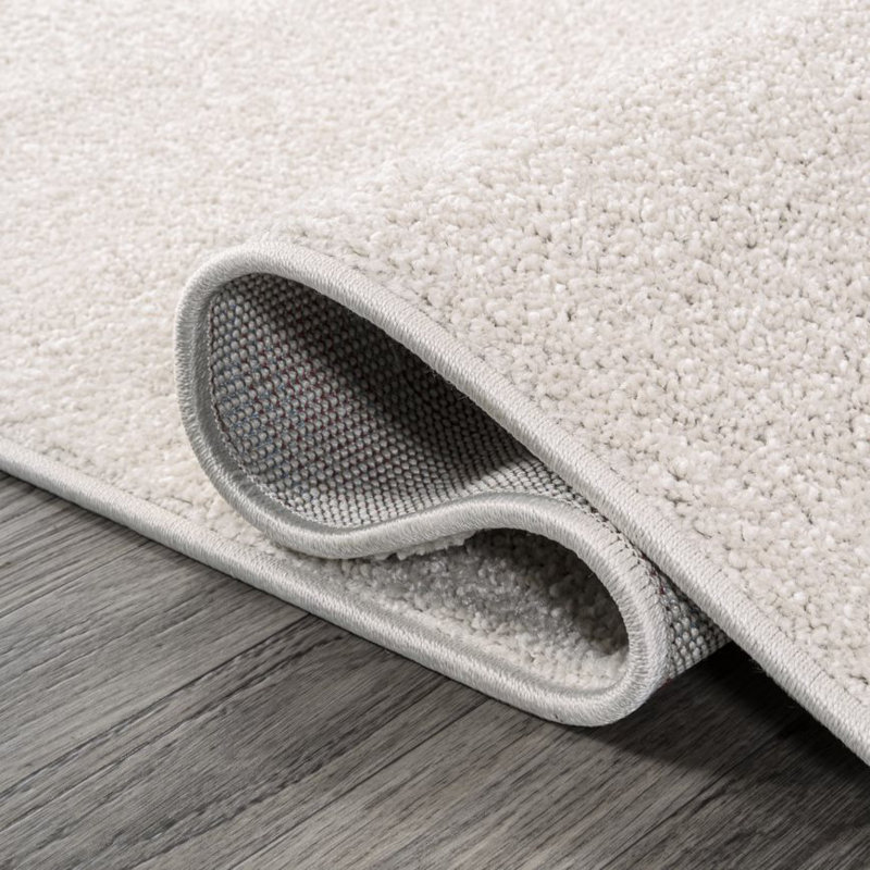 Asala Solid Low-Pile Ivory Rug, Rectangle 2'9" x 5'