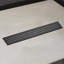 Linear Grid Shower Drain With Levelling Feet In Matte Black