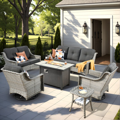 Demariea Outdoor Wicker 7 Person Seating Group With Fire Pit Table With Rocking And Swivel Chairs by Lark Manor