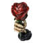 Figurine gothique en forme de griffe squelette tenant une rose rouge