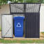 La remise à poubelle peut contenir 2 poubelles en métal