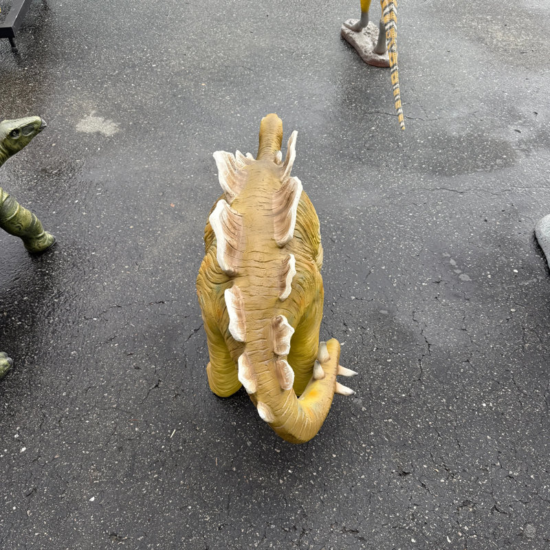 Petite statue de dinosaure stégosaure