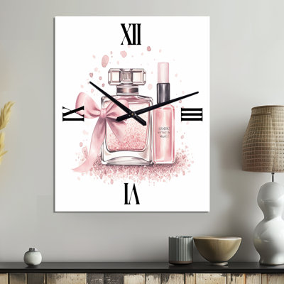 Horloge murale en métal rose