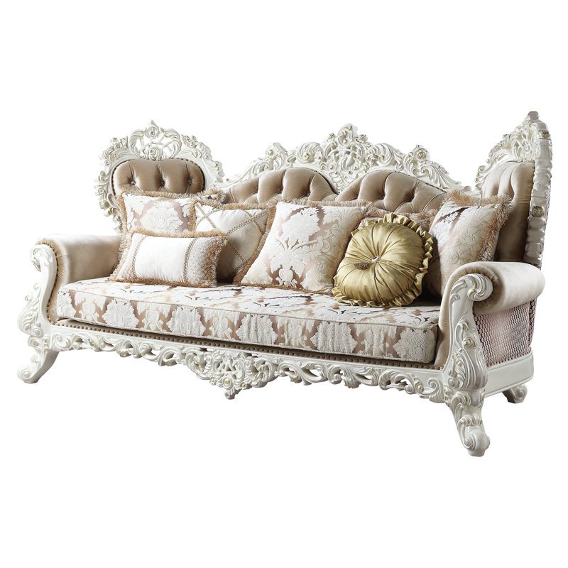 Antique White Tufted Sofa with Floral Cushions and Nailhead Trim