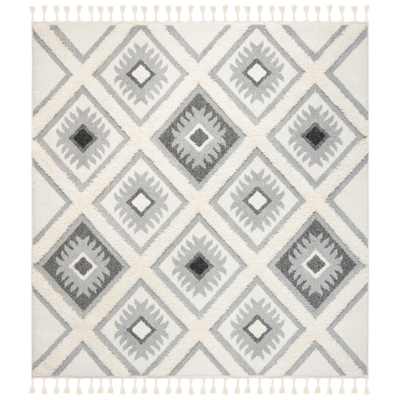 Tapis intérieur / extérieur à motif géométrique à pampilles à motif marocain Imraan