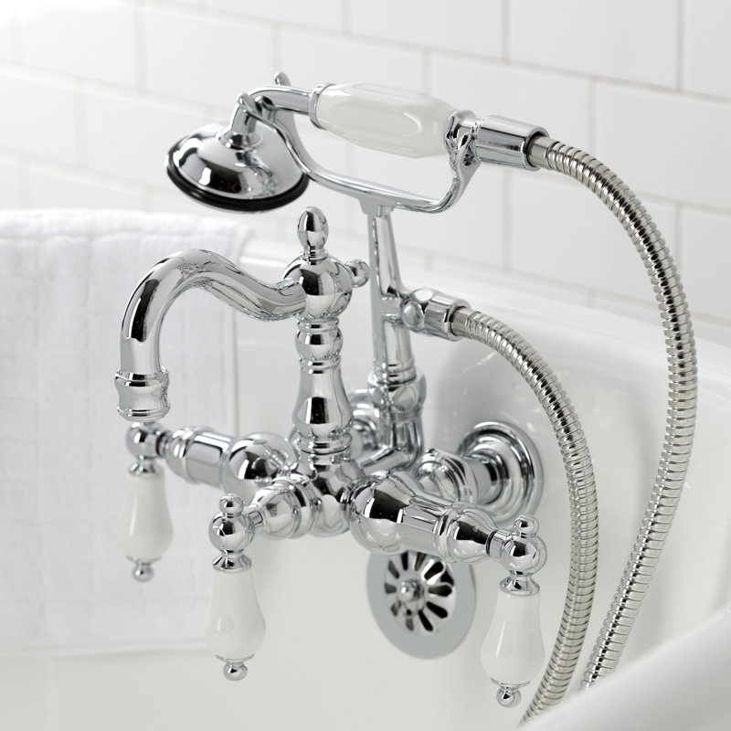 Kingston Brass Heritage Three-Handle 2-Hole Tub Wall Mount Clawfoot Tub Faucet with Hand Shower, Polished Chrome