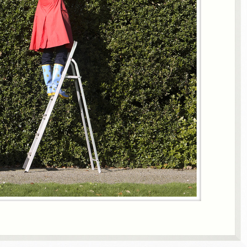 Woman Cutting Large Hedge Giclee Print by Getty Images