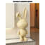 Lapin pelucheux en résine-920835901