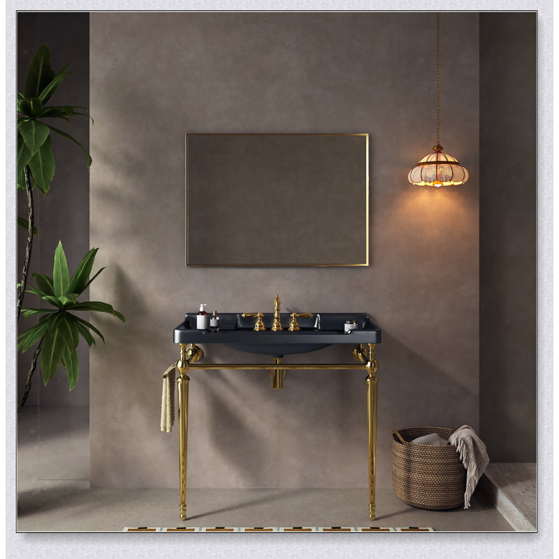 Évier console moderne en céramique avec pieds en acier inoxydable et barre à serviettes intégrée, parfait pour les petites salles de bain