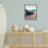 «Blue Boat on Sand Sand», estampe numérique encadrée par Ashley Singleton