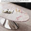 Table basse moderne minimaliste ovale en marbre