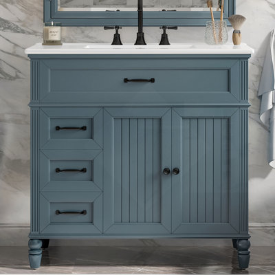 Meuble-lavabo bleu élégant avec lavabo, structure solide, panneau de fibres à densité moyenne et tiroirs spacieux pour les salles de bain modernes
