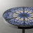 Cheryll Metal Side Table With Geometric Pattern Top And Hammered Base