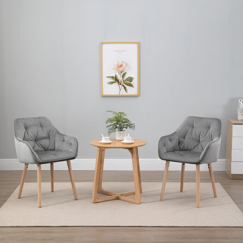 Fauteuil capitonné en velours Pedigree