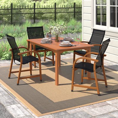 Anautica 4 - Person Wood Patio Dining Set with Rectangular Table