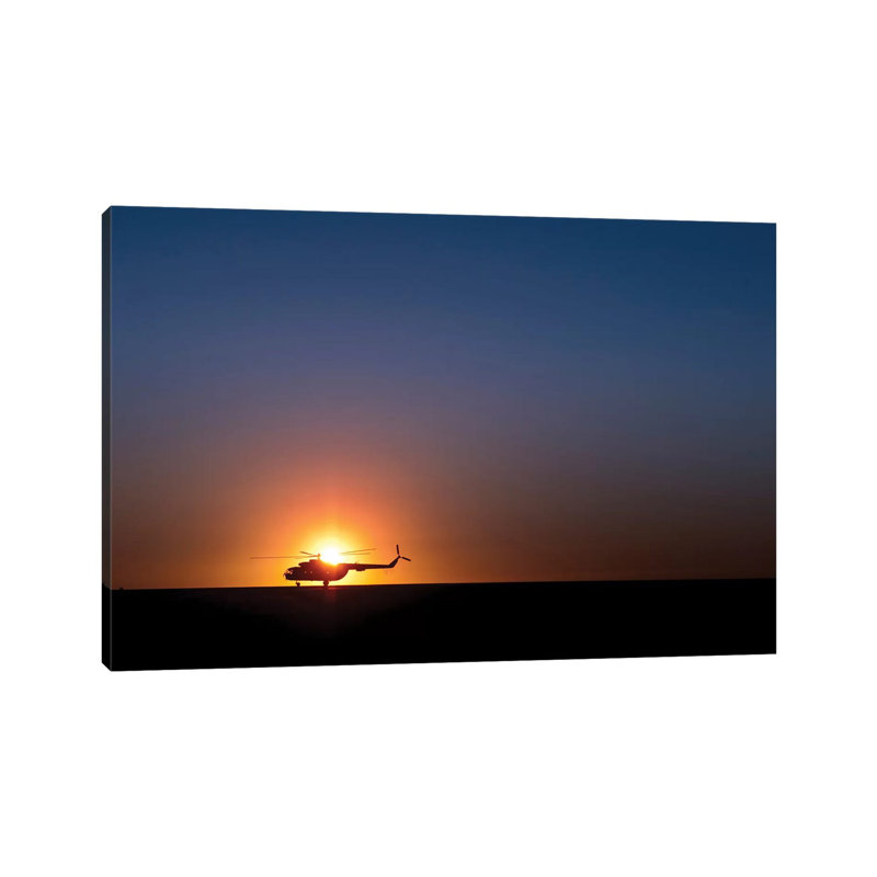 A Sikorsky S-61L Mk II Helicopter Taxis On The Runway During Sunrise by Stocktrek Images - Wrapped Canvas Print