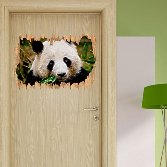 Wandtattoo Kuscheliger Panda frisst Bambus