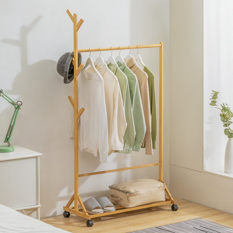 https://assets.wfcdn.com/im/39963979/resize-h755-w755%5Ecompr-r85/2004/200484835/Sliding+Coat+Rack+Bamboo+Clothing+Stand%2C+Wheeled+Caster+Garment+Clothes+Organizer%2C+for+Living+Room.jpg