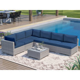 7 Piece Rattan Sectional Seating Group With Cushions