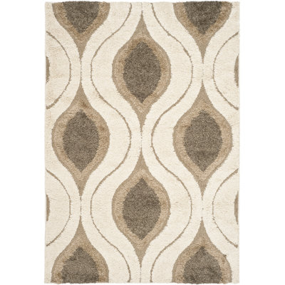 Tapis crème à motif géométrique Bryer