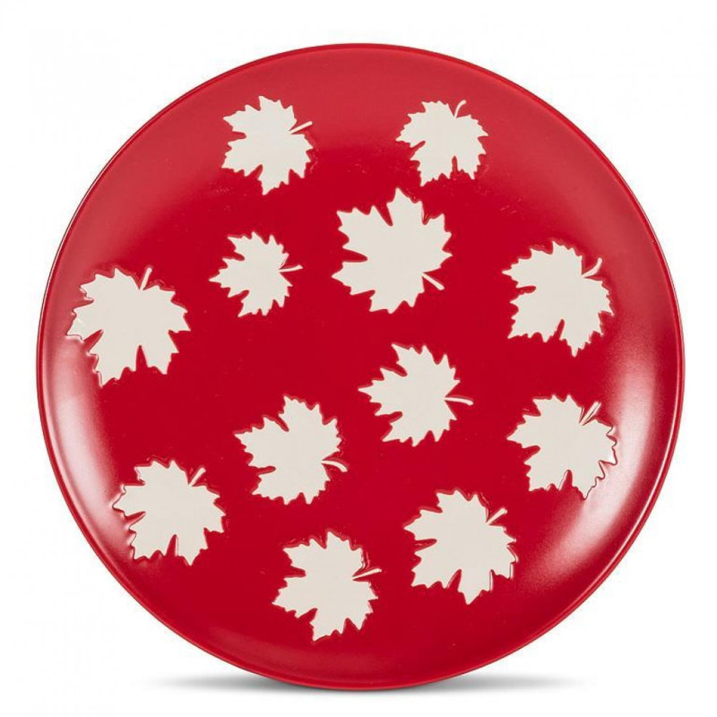 Maple Leaves On Red Plate