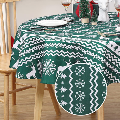 Round Waterproof Christmas Tablecloth – mark Resistant Table Cover – Snowflake & Reindeer Print, Easy Clean – Ideal for Holiday Dining & Parties – 60" Round – Green background (Germany)