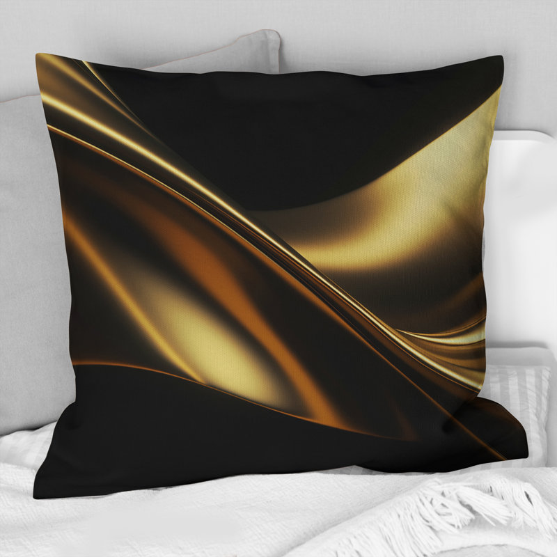 Coussin doré et noir