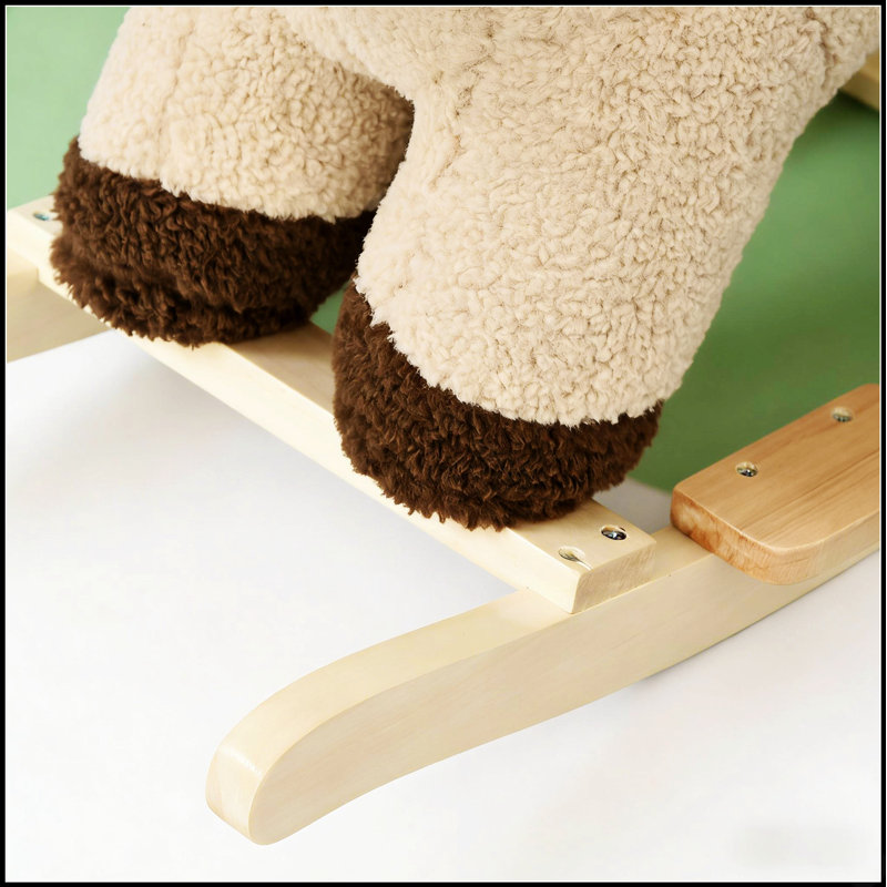 Cheval à bascule en peluche avec des sons rugissants, parfait pour amuser et divertir les enfants