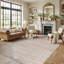 Tapis rayé beige texturé à rayures-710607