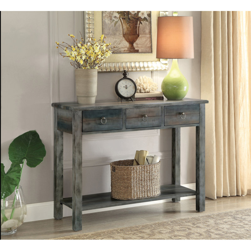 Console en bois antique gris et sarcelle avec rangement, parfaite pour une décoration élégante et fonctionnelle.