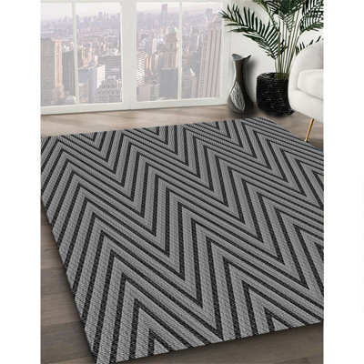 Tapis gris tissé à la machine