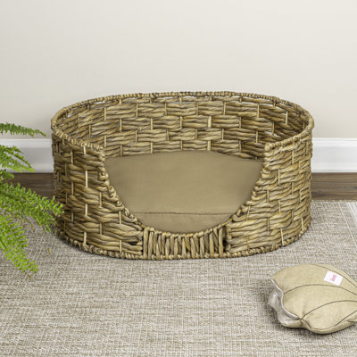 Perri 24" x 18" Classic Farmhouse Handwoven Hyacinth Oval Pet Bed with Machine-Washable Cushion