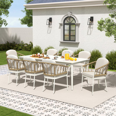 Silvie 9-Piece Wicker Aluminum Patio Dining Set With Rectangular Table And Beige Cushions