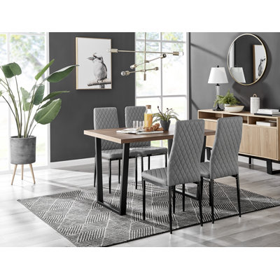 Edward Wood Effect Pedestal Dining Table Set with 4 Luxury Faux Leather Dining Chairs -  East Urban Home, F604BD4CC1A74EC7993F55E45593C7FB