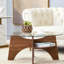 Table basse ronde en verre avec base en éventail Levi-748726807