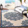 Tapis intérieur / extérieur beige / bleu marine Arneshia