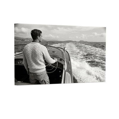 Fashion Man Steering Boat On Water