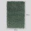 Lush shaggy carpet in  green-341375986