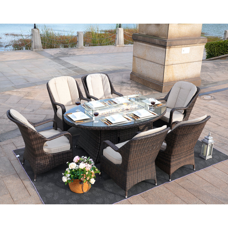 6 - Person Patio Dining Set Oval Table with Cushions Included