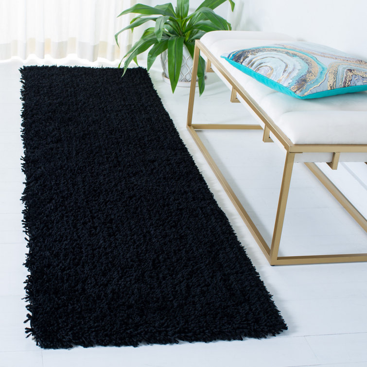 Assar Black Area Rug