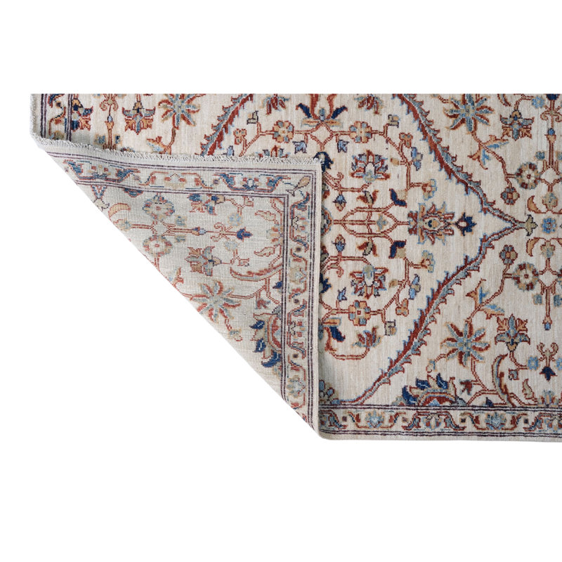 Hand Knotted Wool Area Rug in Beige