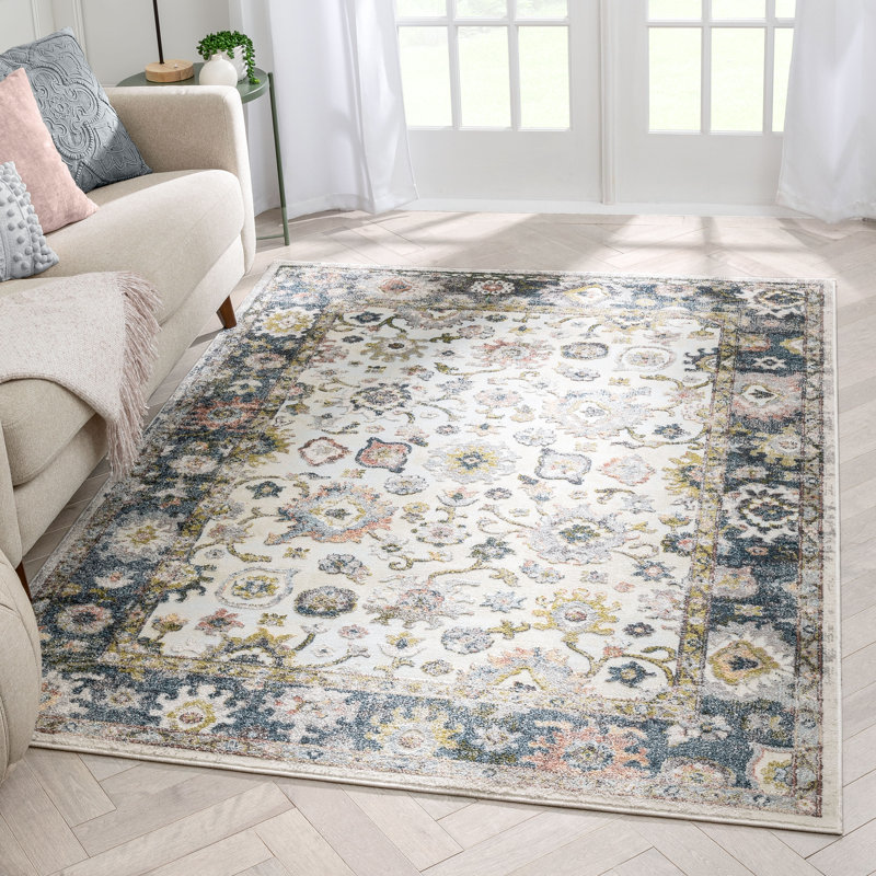 Ivory and Blue Synthetic Oriental Area Rug 5'3" x 7'3"